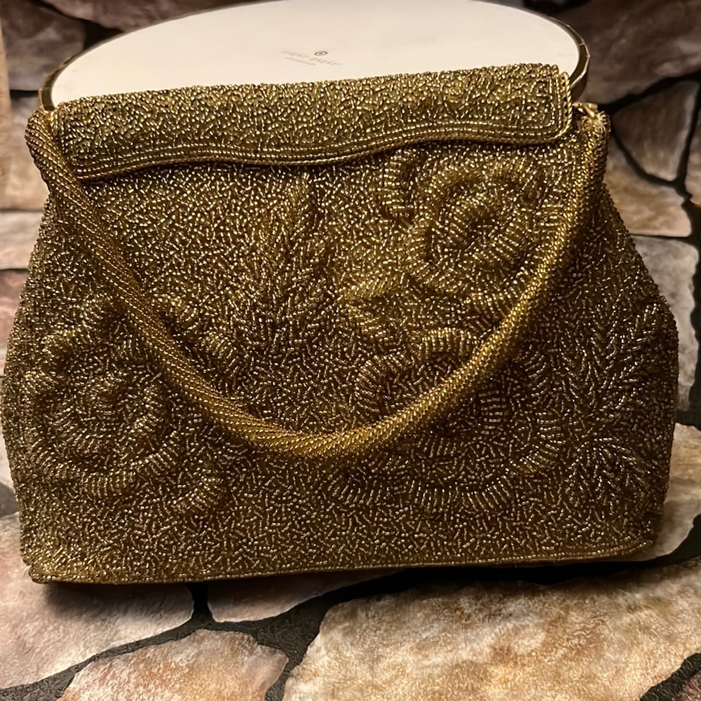 Gold beating vintage handbags with handle snap closure satin tan lining